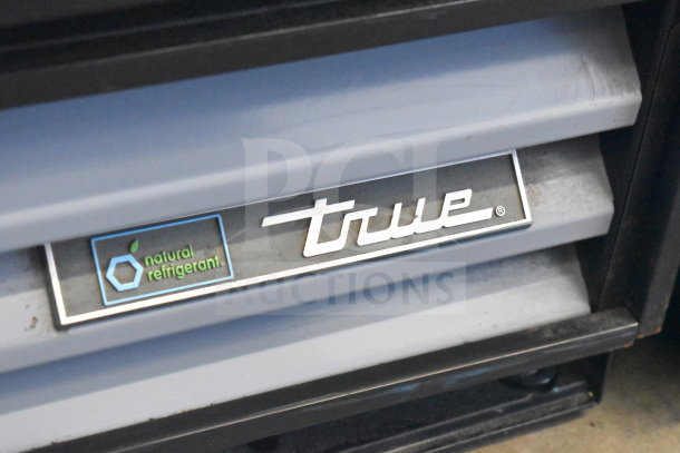 2018 True GDM-12-HC-LD cooler, single door, 115 volts, 1 phase, featuring energy-efficient natural refrigerant label.