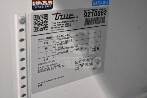 2018 True GDM-12-HC-LD cooler's label showing model, 115V, 1 Phase, and Energy Star rating. Ideal for commercial use.