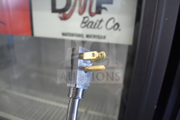 True GDM-12 commercial cooler plug, 115 volts, 1 phase, with branding visible inside. Good condition.