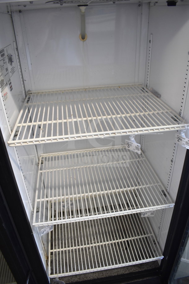 True GDM-12 Commercial Single Door Cooler; 115V, features white wire shelves, interior labels, good condition.