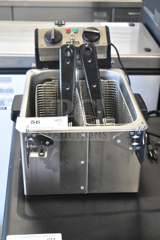 Brand new Waring WDF75RC countertop deep fryer, 8.5 lb capacity, 120V, with minor scratches and dents.
