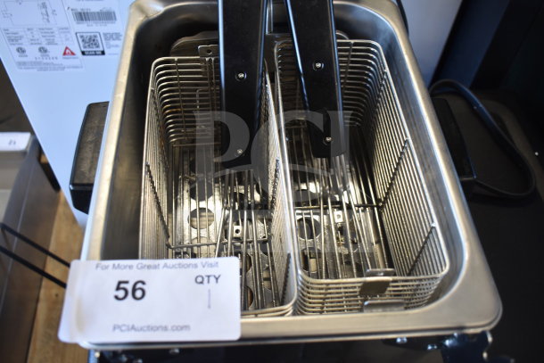 Waring WDF75RC 8.5 lb. commercial countertop deep fryer, brand new, visible dual fry baskets, scratch and dent condition.