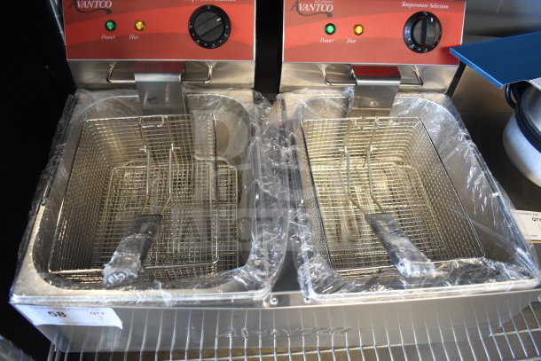 Brand new Avantco 177F102 dual tank electric fryer with two baskets and lids, 20 lb. capacity, 120V, scratch and dent.