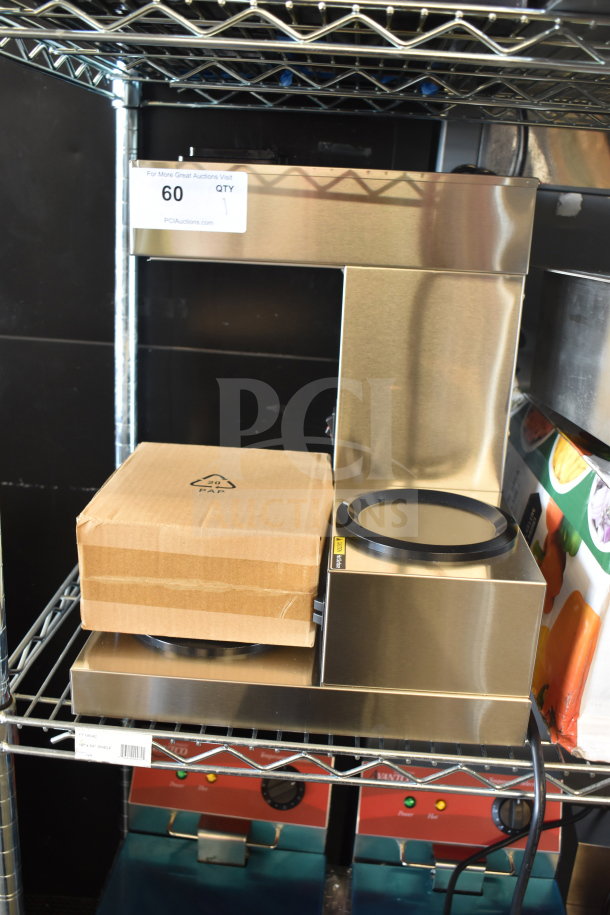 Brand new Avantco 177C30 pourover coffee maker with 3 warmers, minor dents. Stainless steel, 120V, 1 phase.
