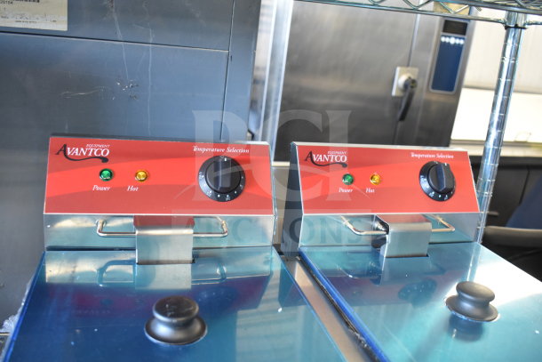 Brand new Avantco 177F102 dual tank fryer, 20 lb. capacity, with scratch and dent, two baskets, lids, 120V, 1 phase.