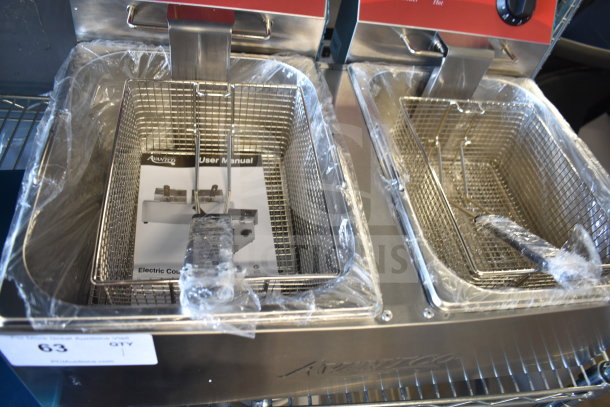 Brand new Avantco 177F102 dual tank electric countertop fryer, 20 lb. capacity, with two fry baskets and lids, 120V.