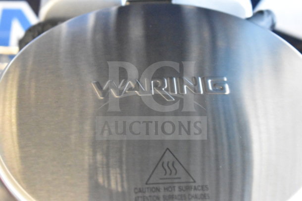 Brand new 2023 Waring WWD200 Double Waffle Maker, scratch and dent, non-stick, 120V, 1 phase, with caution markings.