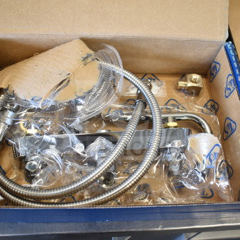 BRAND NEW SCRATCH AND DENT T&S B-1172 faucet, chrome finish, flexible hoses, in original packaging with visible minor wear.