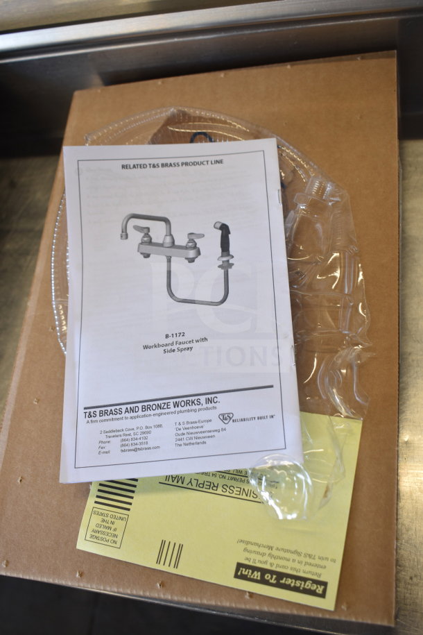 BRAND NEW T&S B-1172 Faucet with side spray, scratch and dent, packaged with instruction manual and warranty card.