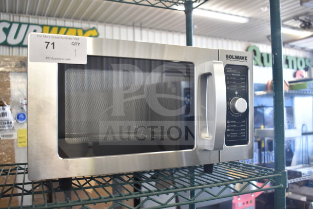 BRAND NEW Solwave 180MW1000D stainless steel commercial microwave, dial control, 120V, slight scratch, model tag visible.