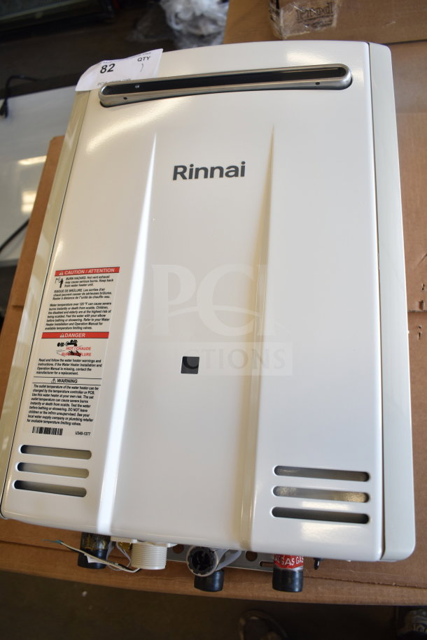 Brand new Rinnai V53De gas wall-mounted outdoor tankless water heater, 120V, 120,000 BTU, 5.3 GPM, minor scratches.