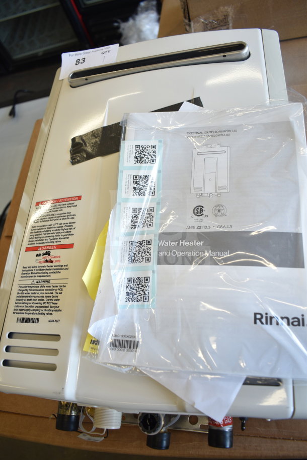 BRAND NEW Rinnai V53De gas tankless water heater, 120V, 120,000 BTU, 5.3 GPM, wall-mounted, includes manual, scratch and dent condition.