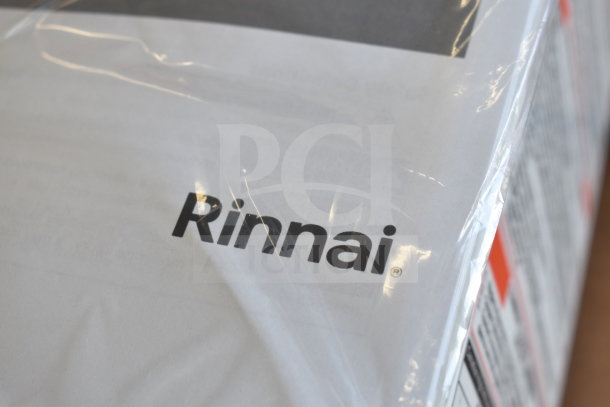 Brand new Rinnai V53De gas wall-mounted outdoor tankless water heater, 120V, 120,000 BTU, 5.3 GPM, with original packaging.