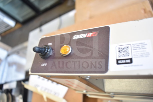 BRAND NEW ServIt 423SW54TLHDBLA 54" lighted double strip warmer with toggle controls, 120V, scratch and dent condition.