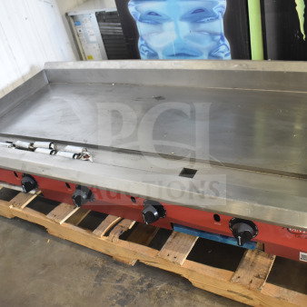 Brand new Avantco 177CAG60 60" commercial gas griddle with thermostatic controls, slight scratches, on wooden pallet.