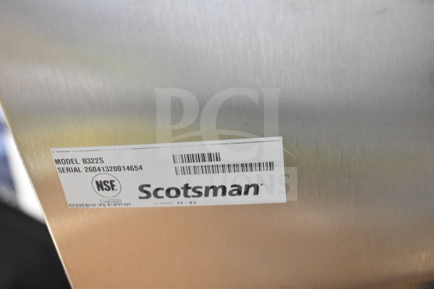 BRAND NEW Scotsman B322S Ice Storage Bin, 370 lb capacity, stainless steel exterior, model and NSF label visible.