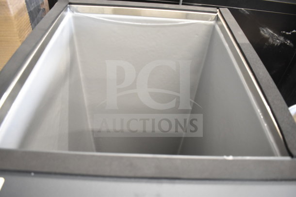 BRAND NEW Scotsman B322S Ice Storage Bin, 370 lb. capacity, stainless steel exterior, minor scratches and dents visible.