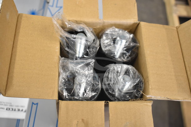 Open box showing parts of a Scotsman B322S Ice Storage Bin, wrapped in plastic, indicating new condition.