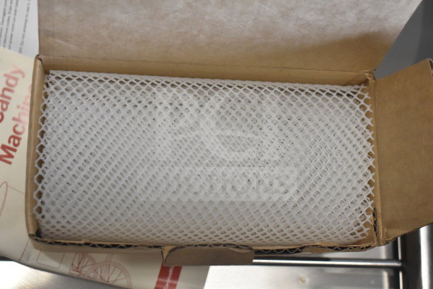 BRAND NEW Carnival King 382CCM21CT Cotton Candy Machine packaging showing protective mesh cover in box.