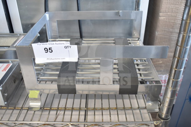 Brand new scratch and dent stainless steel unit, includes visible tag marked "95" for auction reference.