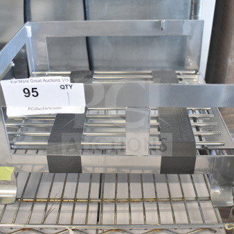 Brand new scratch and dent stainless steel unit, includes visible tag marked "95" for auction reference.