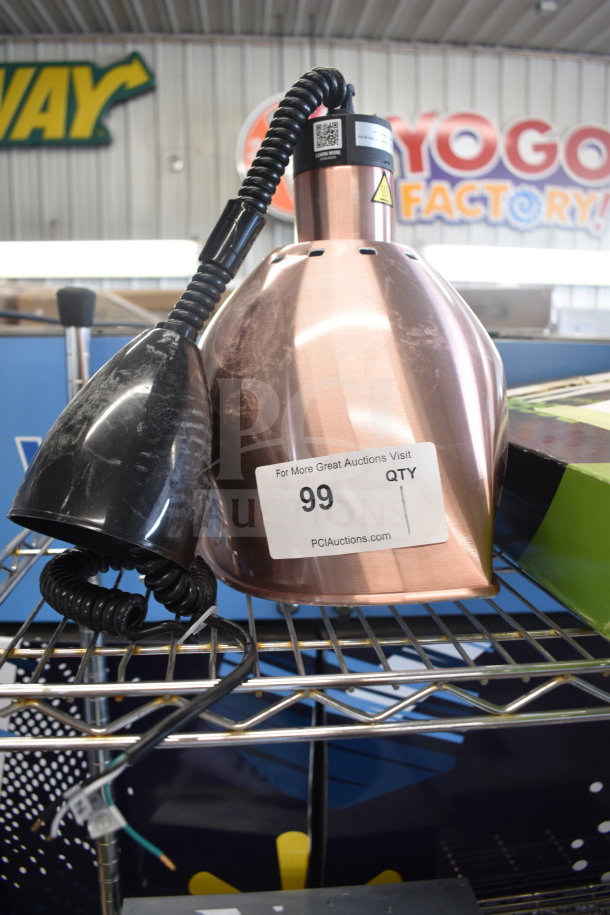 Brand new ServIt 423HLR85CR heat lamp with retractable cord and modern copper finish and round dome shade.