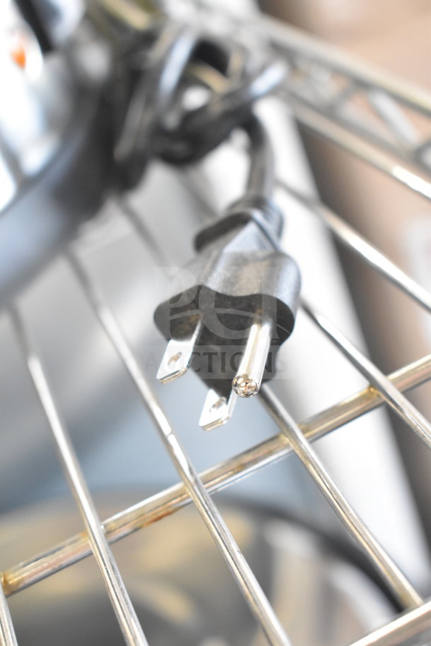 Avantco 177CU65ETL coffee urn power cord plug on a metal rack; 120 volts, new condition.