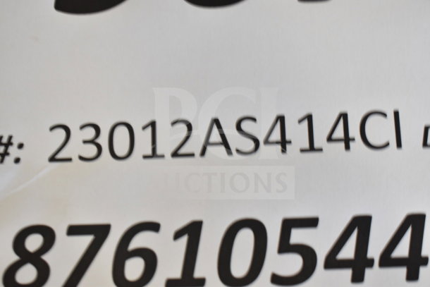 Alt text: Close-up of a label showing the serial number "23012AS414CI" for a Follett 12CI414A-S Ice Maker.