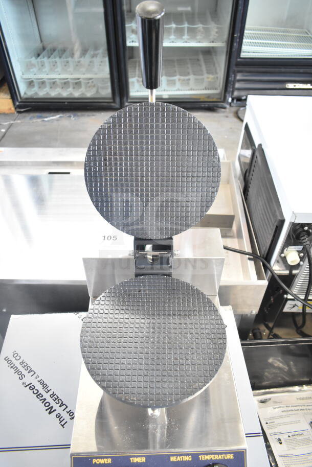 Brand new Carnival King 382WCM1 waffle cone maker, 8" non-stick surface, 120V, slight scratch and dent.