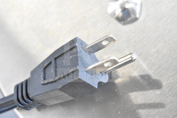 Plug of Carnival King 382WCM1 Waffle Cone Maker showing standard 120V connector. Brand new with minor scratches.