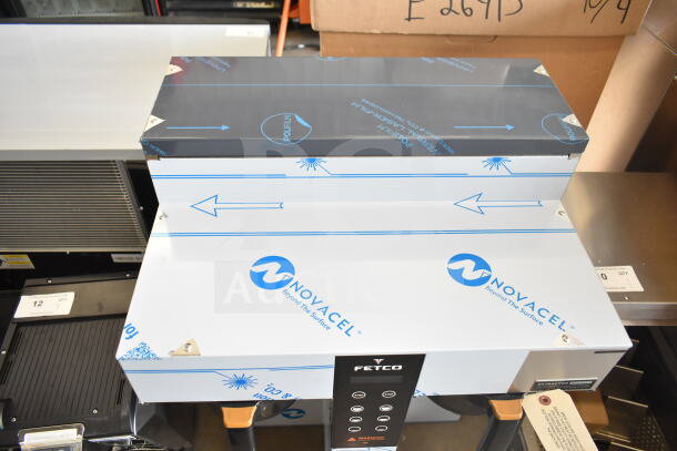 BRAND NEW 2025 Fetco CBS-1252 Plus Series Twin Digital Coffee Brewer, plastic brew basket, 208/240V, protective film visible.