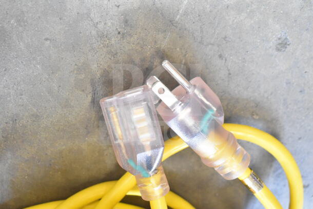 Yellow power cord with clear plug from ProTeam GoFit® 6 Qt. Backpack Vacuum. New with slight imperfections.