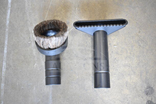 Two ProTeam vacuum attachments: a brush with bristles and a flat suction tool. Both are black and in new condition.