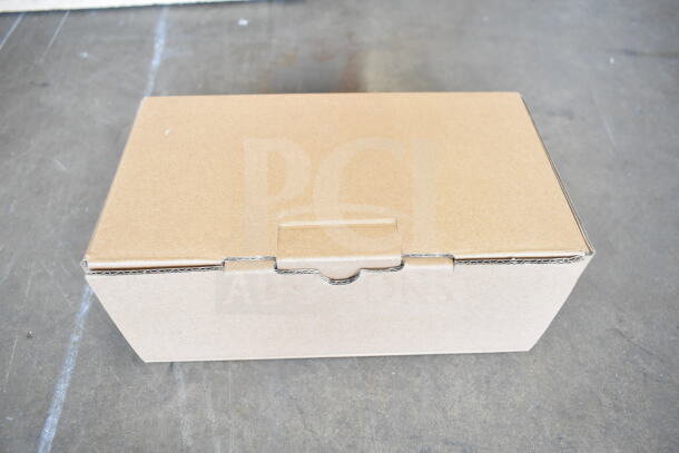 Brown cardboard box containing a ProTeam GoFit® 6 cordless backpack vacuum, sealed and ready for shipment.