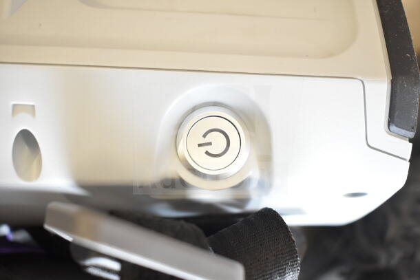 BRAND NEW SCRATCH AND DENT! ProTeam GoFit® 6 Qt. Cordless Vacuum with 4.0 Ah battery and Xover Wand Kit; close-up of power button.