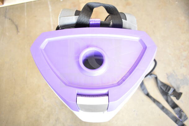Brand new ProTeam GoFit® 6 Qt. cordless backpack vacuum, purple top, 4.0 Ah, with Xover wand kit; minor scratches.