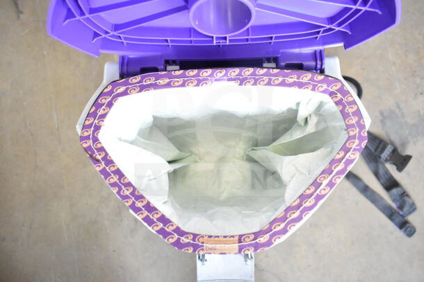 BRAND NEW ProTeam GoFit® 6 Qt. Cordless Backpack Vacuum, open lid view, purple and white design, scratch and dent condition.