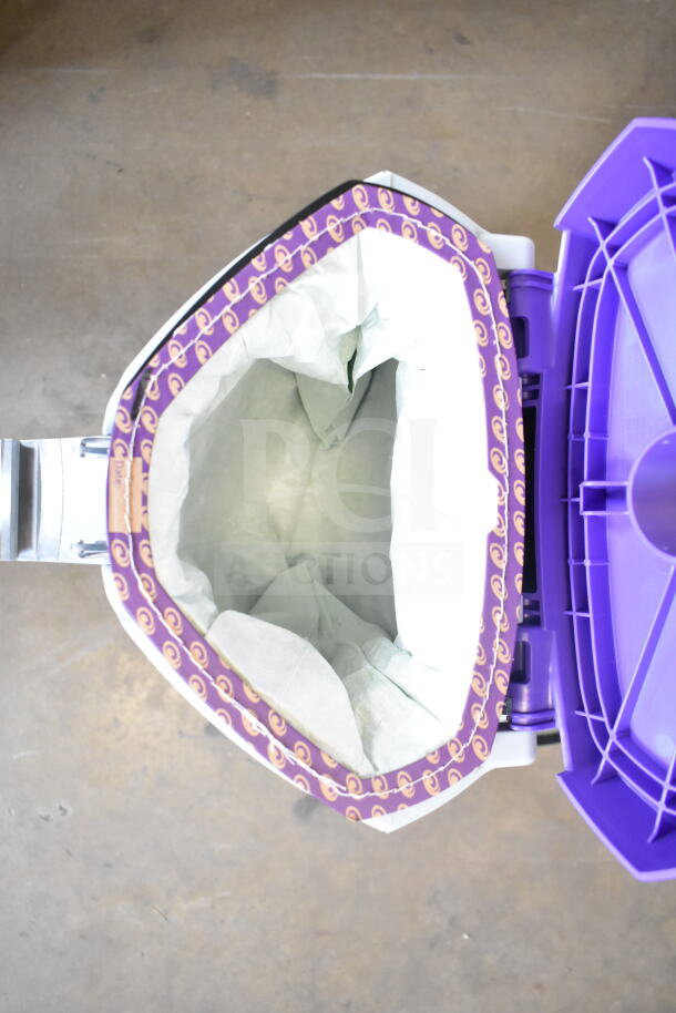 BRAND NEW ProTeam GoFit 6 Qt Cordless Backpack Vacuum; visible inner compartment with purple trim, part of ProBlade kit.