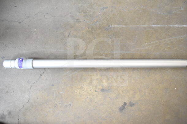 Long, cylindrical metallic vacuum wand with a purple adjustment ring, part of the ProTeam GoFit® 6 backpack vacuum kit.
