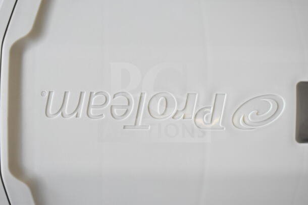 Close-up of ProTeam branding on a white surface of the GoFit 6 backpack vacuum, showing embossed logo detail.