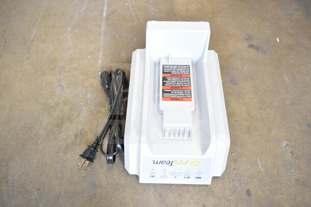 "ProTeam GoFit® 6 Qt. cordless vacuum charger with power cord, new condition, label with safety instructions visible."