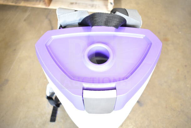 Brand new ProTeam GoFit® 6 Qt. cordless backpack vacuum, model 107786, with purple trim and harness, includes Xover kit.