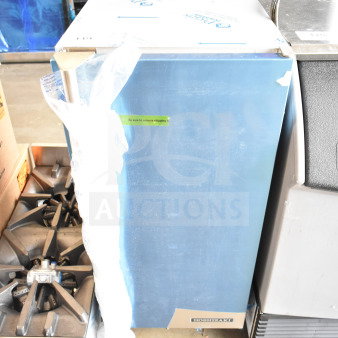 Brand new Hoshizaki AM-50BAK undercounter ice machine, 27 lb. bin, 54 lb. capacity, visible protective wrap and label.