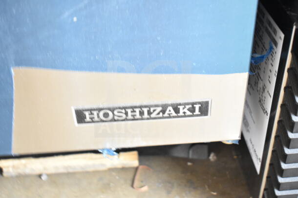 Brand new 2026 Hoshizaki AM-50BAK undercounter ice machine with 27 lb. bin, 54 lb. production; 115V, 1 Phase. Scratch and dent condition. Hoshizaki branding visible.