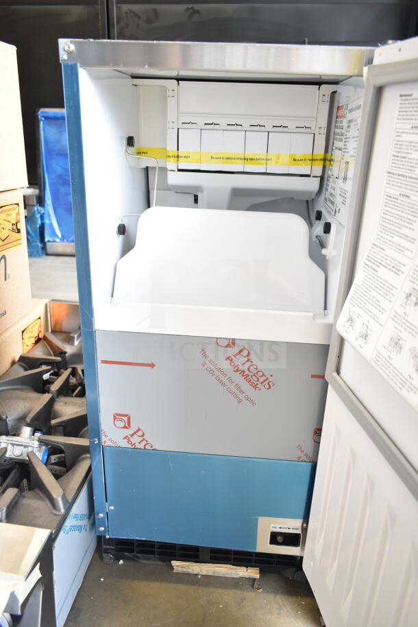 Brand new 2026 Hoshizaki AM-50BAK undercounter ice machine, 27 lb. bin, 54 lb. capacity, 115V, with tags and protective film.