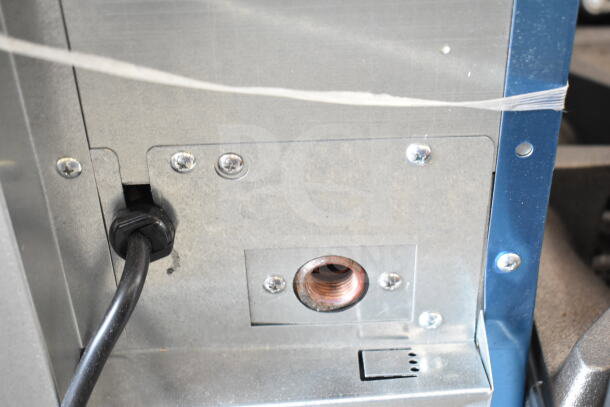 Undercounter ice machine back panel with power cord and copper fitting, Hoshizaki AM-50BAK model, scratch and dent condition.