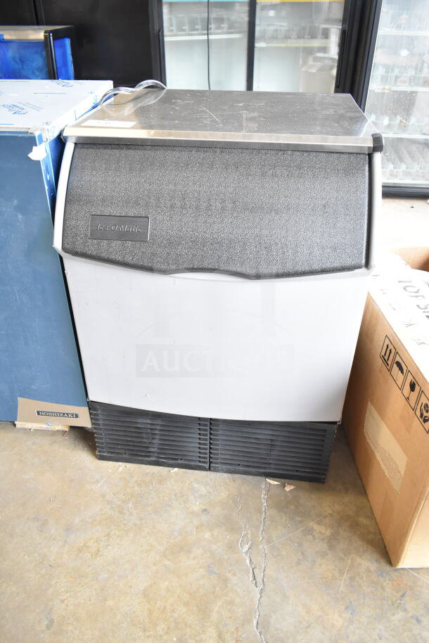 Brand new 2026 Ice-O-Matic CIMU220FA90 undercounter ice machine, 223 lb capacity, 74 lb bin, model tag visible, slightly scratched.