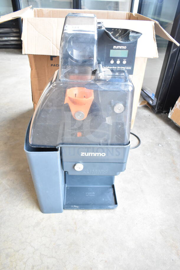 BRAND NEW Zummo Z1-NGP commercial juicer, graphite color, processes 6 fruits/min. Visible minor scratches, 110-120V, 1 Phase.