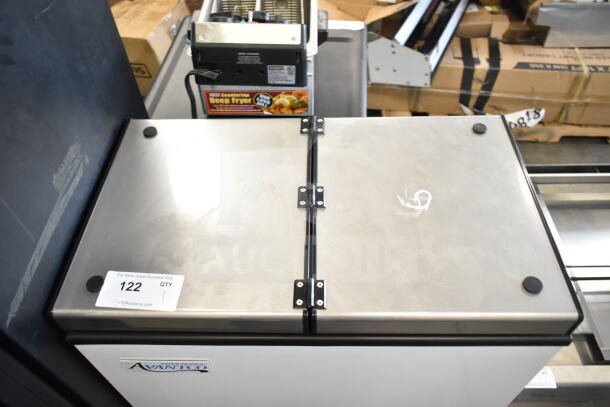 Avantco 360ICF4 ice cream storage freezer, brand new with scratches, four tub capacity, visible label with auction info.