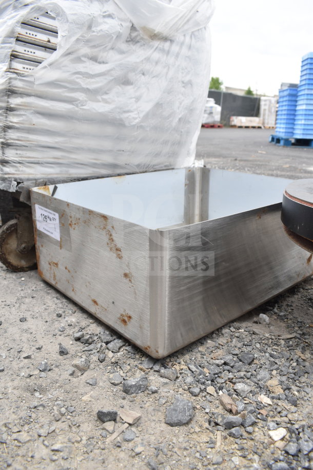 Stainless steel drop-in sink with visible rust, square shape, industrial setting. Label shows "129%" marking.